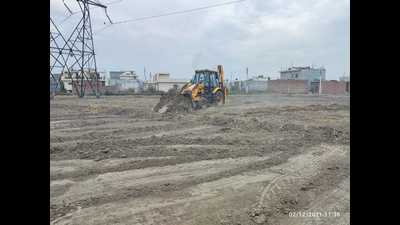 An illegal under-construction colony being razed in Ladian Kalan, Ludhiana, on Thursday. (HT Photo) An illegal under-construction colony being razed in Ladian Kalan, Ludhiana, on Thursday. (HT Photo)