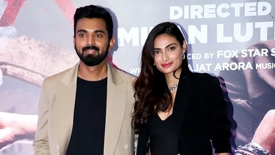 Athiya Shetty and KL Rahul pose for a photo at the special screening of Tadap in Mumbai. (ANI)