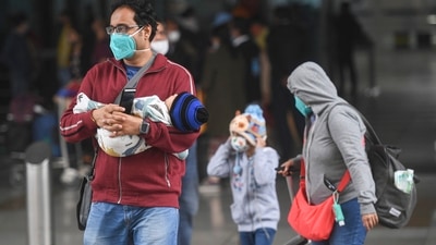 Travellers coming from countries other than those listed as "at risk" will be allowed to leave the airport and shall self-monitor their health for 14 days after arrival, but five per cent of them will be randomly tested at the airport, the revised guidelines stated. (PTI) Travellers coming from countries other than those listed as "at risk" will be allowed to leave the airport and shall self-monitor their health for 14 days after arrival, but five per cent of them will be randomly tested at the airport, the revised guidelines stated. (PTI)