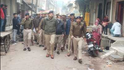 SSP Mathura Dr Gaurav Grover leads a police march through lanes and market of Mathura city on Thursday (ht photo) SSP Mathura Dr Gaurav Grover leads a police march through lanes and market of Mathura city on Thursday (ht photo)