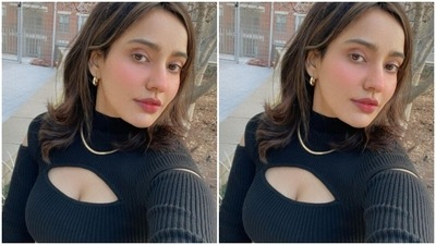 In minimal makeup – soft pink contoured cheeks and a shade of pink lipstick – Neha was ready to stun Illinois. (Instagram/@nehasharmaofficial)