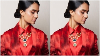 Amruta paired a red satin shirt with a pair of red satin trousers with wide legs. (Instagram/@amrutasubhash)