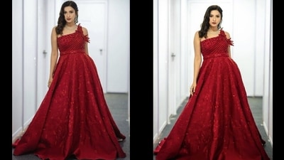 Leaving her silky soft curls open down her back in side-parted hairstyle, Gauahar amplified the glam quotient with a dab of bold red lipstick, rosy blushed and highlighted cheeks, kohl-lined eyes with black eyeliner streaks, mascara-laden eyelashes and filled-in eyebrows. (Instagram/gauaharkhan)