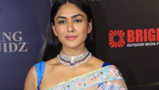 Mrunal Thakur seen in a saree at the event. Her upcoming movie is Jersey with Shahid Kapoor.