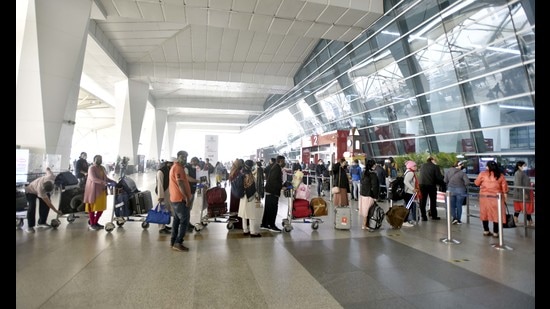 Passengers queue for document verification at Terminal 3 of Delhi’s IGI airport on Thursday. (Sanjeev Verma/HT)