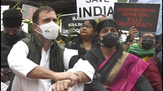 Congress leader Rahul Gandhi takes part in a protest over suspension of 12 Rajya Sabha lawmakers at Parliament House in New Delhi on Thursday. (Arvind Yadav/HT PHOTO) Congress leader Rahul Gandhi takes part in a protest over suspension of 12 Rajya Sabha lawmakers at Parliament House in New Delhi on Thursday. (Arvind Yadav/HT PHOTO)