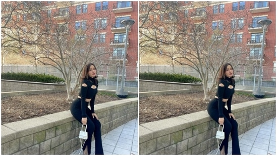 Neha teamed a black turtle-neck top with a pair of high-waisted black trousers.(Instagram/@nehasharmaofficial)