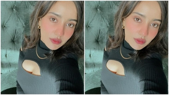 Neha's turtleneck cropped top came with cold shoulders and a midriff-baring detail.(Instagram/@nehasharmaofficial)