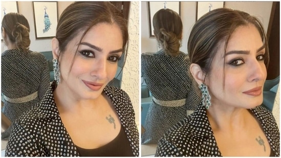 Raveena Tandon is in the mood for selfies. The actor decked up in a stunning attire on Wednesday and clicked a slew of mirror selfies, which she later shared on her Instagram profile. In a black and white dress, Raveena looked stunning in her mirror selfies.(Instagram/@officialraveenatandon)