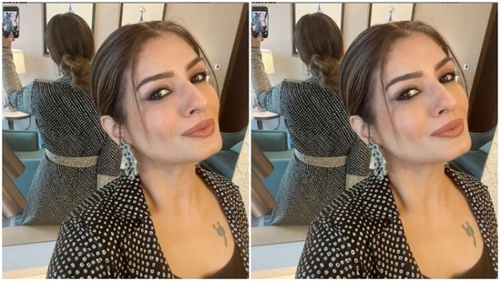 Raveena looked ravishing in a black dress with white polka dots, with a black belt at the waist.(Instagram/@officialraveenatandon)