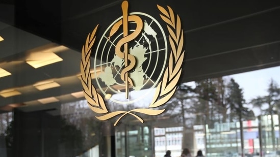 A logo is pictured outside a building of the World Health Organization, Geneva, Switzerland