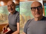 Anupam Kher poses in the new glasses brought for him by Anil Kapoor. 
