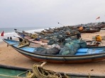 Boats anchored along the sea shore in view of cyclone Jawad in Odisha's Puri on Friday. (PTI PHOTO.) Boats anchored along the sea shore in view of cyclone Jawad in Odisha's Puri on Friday. (PTI PHOTO.)