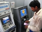 Currently, a customer has to pay <span class='webrupee'>₹</span>20 per ATM withdrawal after five free transactions a month from a bank she has an account in.(HT/ PHOTO) Currently, a customer has to pay <span class='webrupee'>₹</span>20 per ATM withdrawal after five free transactions a month from a bank she has an account in.(HT/ PHOTO)