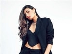 Athiya Shetty stepped out to attend the screening of the upcoming Tara Sutaria-Ahan Shetty starrer Tadap, on Thursday. To slay the red carpet look, Athiya decked up in an all-black formal outfit and looked like a perfect boss lady.(Instagram/@chandiniw)