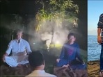 Milind Soman-Ankita Konwar meditate outdoors at night, ace Yoga's Sukhasana