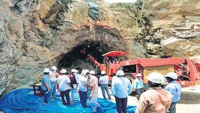 Officials at the excavation of pressure tunnels for Polavaram Power Station at Polavaram, in West Godavari. (ANI)