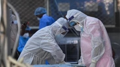 Health workers wearing PPE kits in hospital. (Representative image) Health workers wearing PPE kits in hospital. (Representative image)