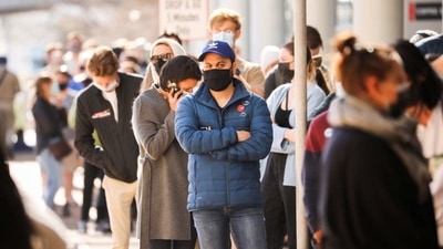 People queue outside a coronavirus disease (Covid-19) vaccination centre in Cape Town, South Africa.&nbsp; (File Photo / REUTERS)