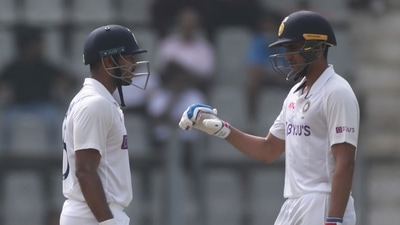 India's Shubman Gill, right, chats with Mayank Agarwal during the day one of second test cricket match against New Zealand in Mumbai, India, Friday, Dec. 3, 2021.(AP Photo/Rafiq Maqbool) (AP)