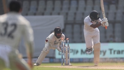 India's Cheteshwar Pujara is bowled during the day one of second test cricket match against New Zealand in Mumbai, India, Friday, Dec. 3, 2021. (AP)