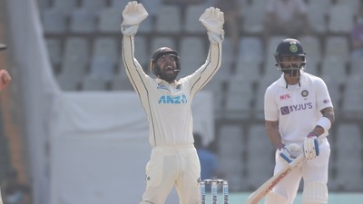 New Zealand players appeal for the dismissal of India's captain Virat Kohli, right, during the day one of second test cricket match against India in Mumbai, India, Friday, Dec. 3, 2021. (AP) New Zealand players appeal for the dismissal of India's captain Virat Kohli, right, during the day one of second test cricket match against India in Mumbai, India, Friday, Dec. 3, 2021. (AP)
