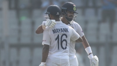 India's Mayank Agarwal is greeted by his team player Shreyas Iyer after scoring 50 runs during the day one of second test cricket match against New Zealand in Mumbai, India, Friday, Dec. 3, 2021.(AP Photo/Rafiq Maqbool) (AP)
