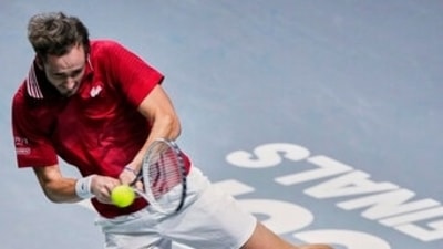 Russian Tennis Federation's Daniil Medvedev returns the ball to Sweden's Mikael Ymer during a Davis Cup quarter final match between Russian Tennis Federation and Sweden at the Madrid Arena stadium in Madrid, Spain, Thursday, Dec. 2, 2021. (AP) Russian Tennis Federation's Daniil Medvedev returns the ball to Sweden's Mikael Ymer during a Davis Cup quarter final match between Russian Tennis Federation and Sweden at the Madrid Arena stadium in Madrid, Spain, Thursday, Dec. 2, 2021. (AP)