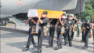 Army personnel carry the mortal remains of Colonel Viplav Tripathi, Commanding officer of Khuga Battalion of the Assam Rifles, in Raigarh. (ANI)