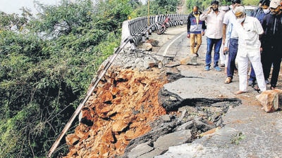 TTD Board Chairman YV Subba Reddy with officials inspects the road damaged due to landslides on Tirumala Hills on December 1. (PTI)