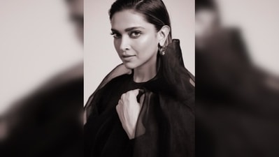 Deepika Padukone styled her black see-through saree with a closed neck long sleeve blouse. (Instagram/@deepikapadukone)