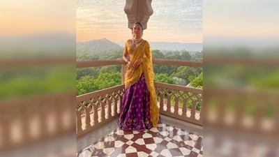 Esha Gupta redefines elegance and royalty as she poses in an embellished yellow and purple lehenga from a fort in Jaipur. (Instagram/@egupta) Esha Gupta redefines elegance and royalty as she poses in an embellished yellow and purple lehenga from a fort in Jaipur. (Instagram/@egupta)