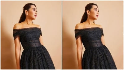 Karisma decked up in an off-shoulder black dress from the house of Gauri and Nainika. (Instagram/@therealkarismakapoor)