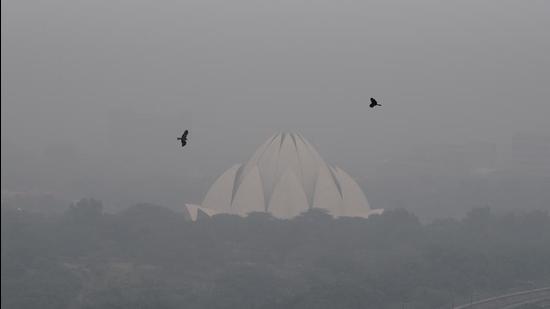 The Lotus Temple shrouded in a haze on Friday. (Amal KS/HT)