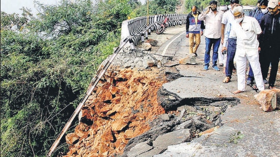 TTD Board Chairman YV Subba Reddy with officials inspects the road damaged due to landslides on Tirumala Hills on December 1. (PTI) TTD Board Chairman YV Subba Reddy with officials inspects the road damaged due to landslides on Tirumala Hills on December 1. (PTI)
