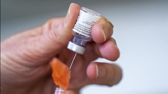 A syringe is loaded with the Pfizer Covid-19 vaccine at a clinic in Richmond, British Columbia, Canada on April 10. (AP/FILE)