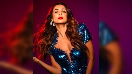 Malaika Arora opted for diamond earrings and rings to complement her red carpet look.(Instagram/@malaikaaroraofficial)