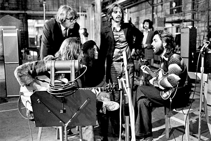 Lennon, McCartney (seated) and Starr (centre) rehearse at the Twickenham studios in 1969, as the band’s assistant Mal Evans and Yoko Ono look on. (Image courtesy Walt Disney Studios) Lennon, McCartney (seated) and Starr (centre) rehearse at the Twickenham studios in 1969, as the band’s assistant Mal Evans and Yoko Ono look on. (Image courtesy Walt Disney Studios)