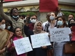 Members of Joint Action Committee carry placards during a protest in Karachi against the killing of a Sri Lankan factory manager in Sialkot after he was beaten to death and set ablaze by a mob who accused him of blasphemy, officials said.