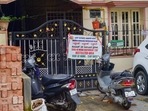 A poster at the residence of the 46-year-old doctor who was detected with the Omicron variant of Covid-19, in Bengaluru, says it is a restricted area. (PTI) A poster at the residence of the 46-year-old doctor who was detected with the Omicron variant of Covid-19, in Bengaluru, says it is a restricted area. (PTI)