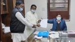 Prem Pal Chauhan, one of the Congress rebel candidates, filing his nomination papers as an Independent from Ward No. 15 in Chandigarh MC election. (HT Photo) Prem Pal Chauhan, one of the Congress rebel candidates, filing his nomination papers as an Independent from Ward No. 15 in Chandigarh MC election. (HT Photo)
