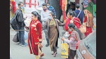 A policewoman takes people who were not wearing a mask, for random Covid testing, at a market in Jammu on Saturday. The Vaishno Devi shrine board is sanitising its premises in sync with the Covid guidelines and protocols. (PTI Photo) A policewoman takes people who were not wearing a mask, for random Covid testing, at a market in Jammu on Saturday. The Vaishno Devi shrine board is sanitising its premises in sync with the Covid guidelines and protocols. (PTI Photo)