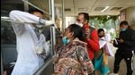 A health worker collects swab samples of a woman for Covid-19 test at a hospital in Noida Sector 30 on Saturday. (Sunil Ghosh /HT) A health worker collects swab samples of a woman for Covid-19 test at a hospital in Noida Sector 30 on Saturday. (Sunil Ghosh /HT)
