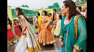 Borrowing, mixing and matching outfits for different functions is the way to go for many Delhi-NCR residents, this wedding season. (Shutterstock)
