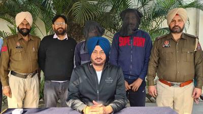The two gang members in CIA staff custody in Ludhiana in Ludhiana on Saturday. (HT Photo) The two gang members in CIA staff custody in Ludhiana in Ludhiana on Saturday. (HT Photo)