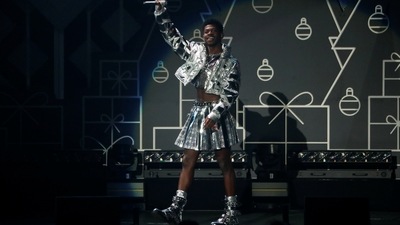 Lil Nas X wears a funky metallic outfit and performs at iHeartRadio Jingle Ball concert. This year's iHeartRadio Jingle Ball Tour is being presented by Capital One. (REUTERS)