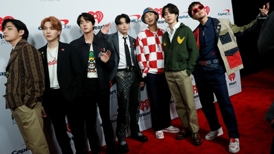 BTS poses at the red carpet as they arrive at the iHeartRadio Jingle Ball concert at The Forum, in Inglewood, California, United States. (REUTERS)