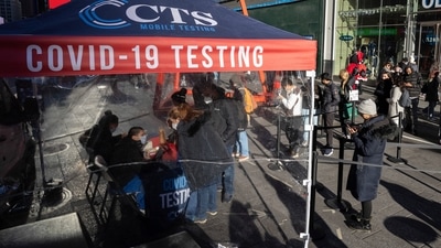 The new strain could further destabilize economies that are still emerging from Covid-19 related lockdowns and disruptions. In picture - Covid-19 testing site in Times Square, New York, US. (AP) The new strain could further destabilize economies that are still emerging from Covid-19 related lockdowns and disruptions. In picture - Covid-19 testing site in Times Square, New York, US. (AP)