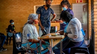 Health Minister Joe Phaahla said at the briefing that infections and positivity rates were rising in seven of South Africa’s nine provinces. (AP) Health Minister Joe Phaahla said at the briefing that infections and positivity rates were rising in seven of South Africa’s nine provinces. (AP)