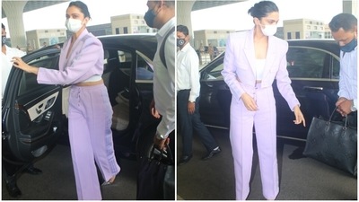 Deepika teamed the cropped jacket with high waist matching pants in a straight fit. They also come in the lavender shade with metallic strips on the side, elastic waist, and drawstrings to cinch it in. (HT Phtoto/Varinder Chawla)